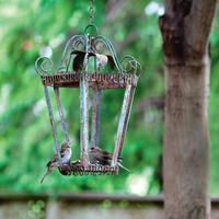 old lantern into birdfeeder. (love this idea--ig)