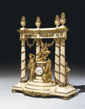 AN UNUSUAL LOUIS XVI STYLE ORMOLU AND CARRARA MARBLE CLOCK