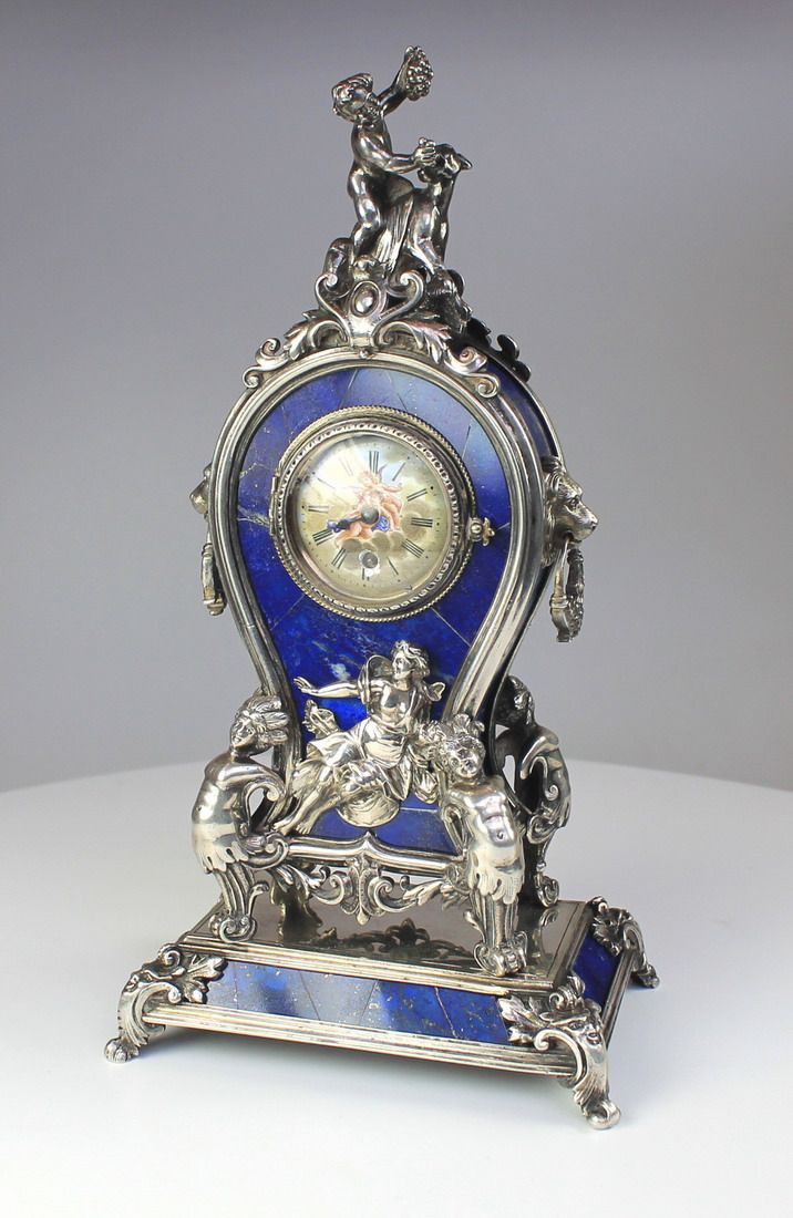 Lot 66 - A silver and lapis boudoir clock, full working. The maker is Leopold We...