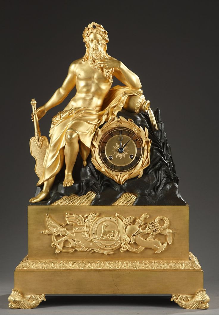 Reloj francés figurativa dorada y negra