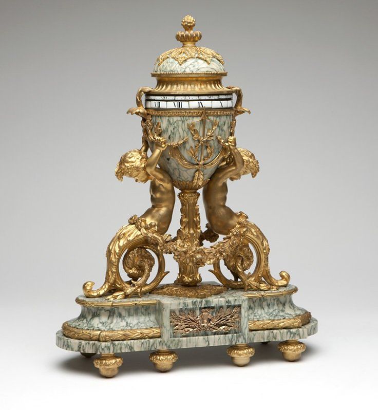 Swiss gilt bronze & marble annular clock, Gubelin - Nov 17, 2015 | John Moran Auctioneers, Inc. in CA on LiveAuctioneers