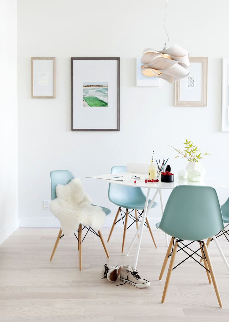 Pastel - pretty dining area with light wood floors